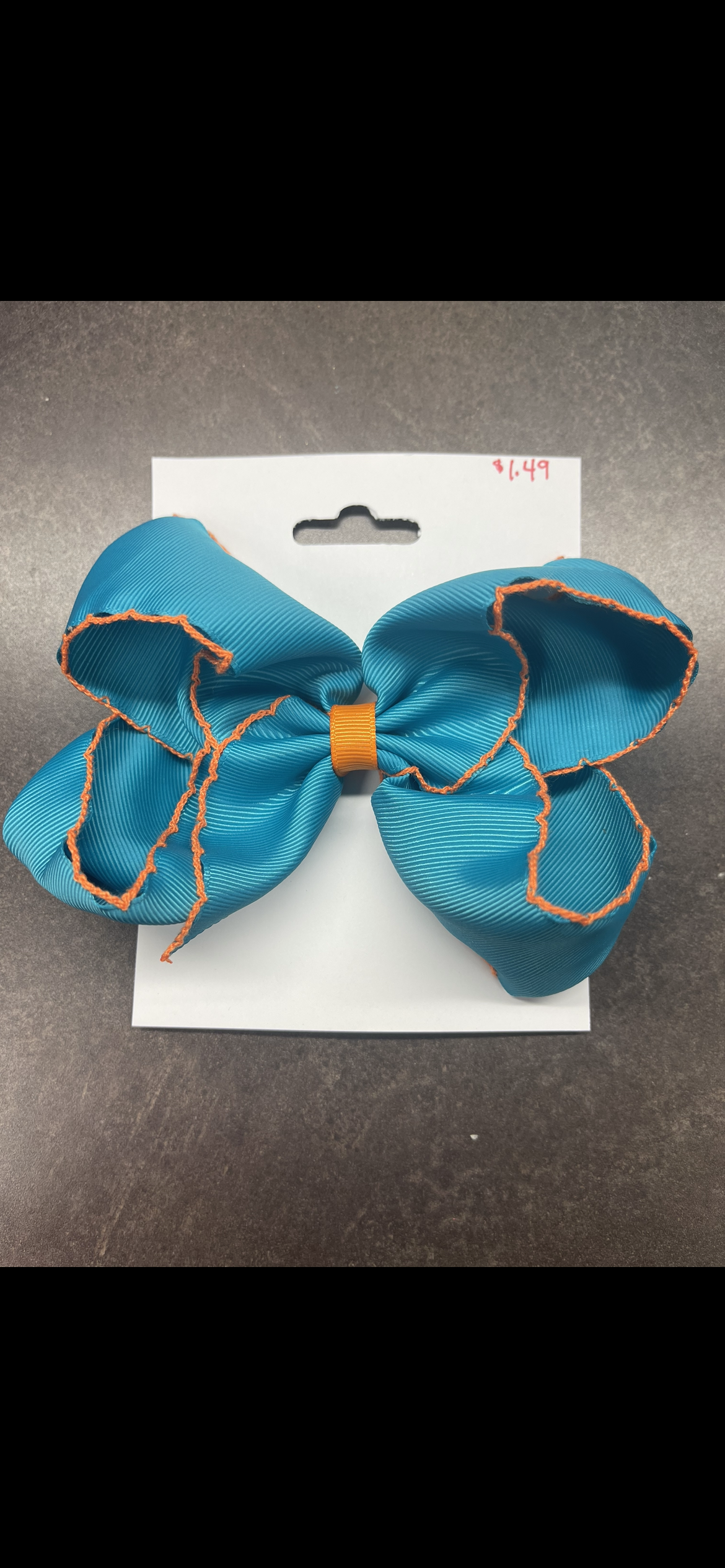 Sky blue and orange bow