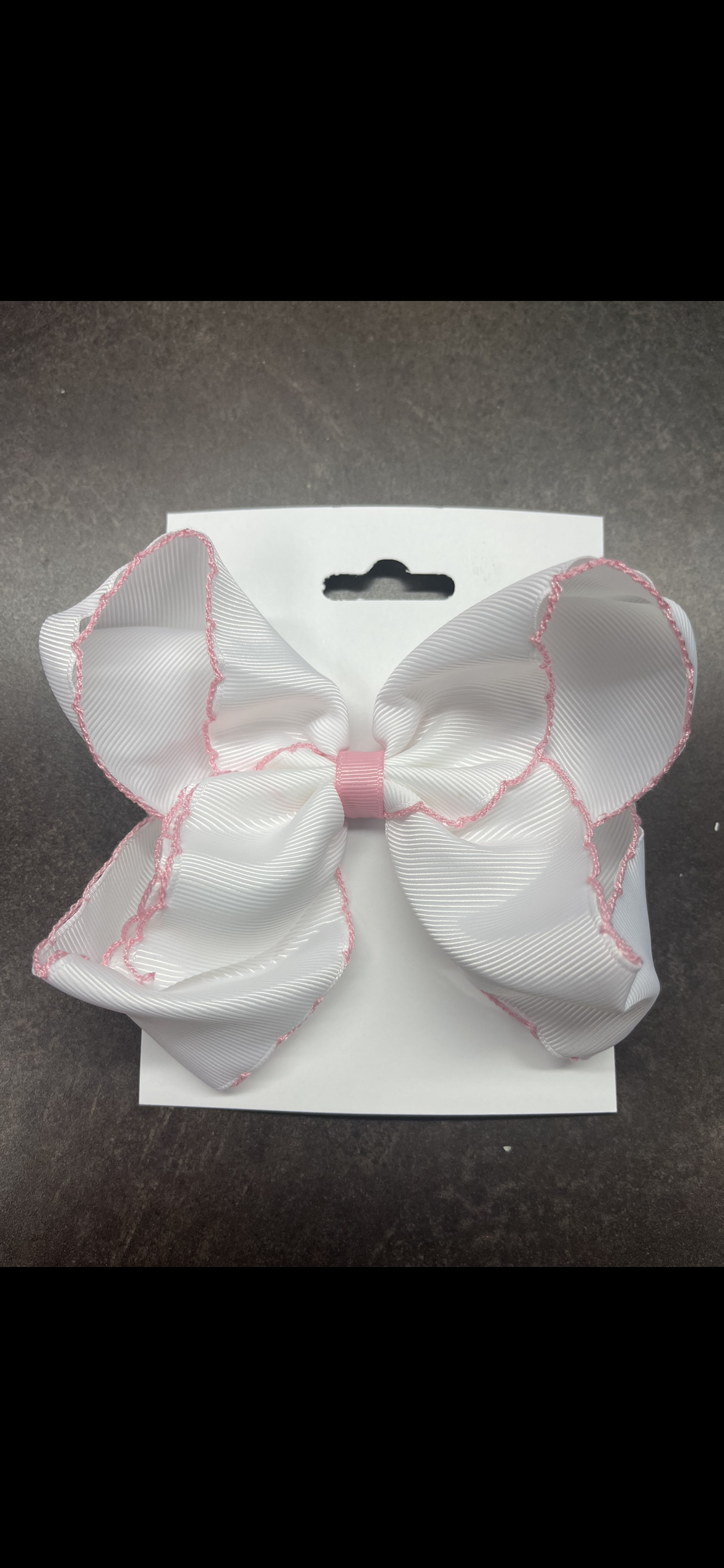 White and pink bow