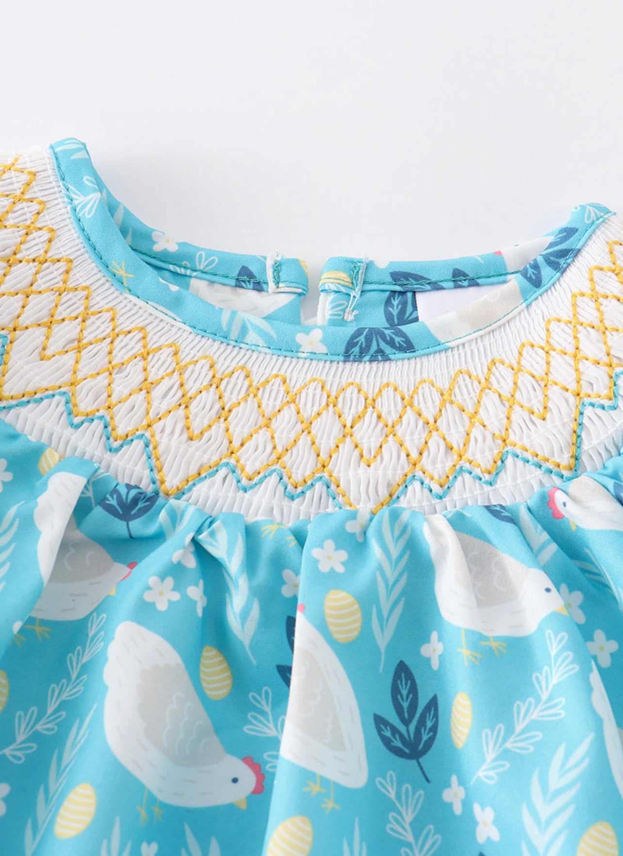 Chicken smocked baby romper